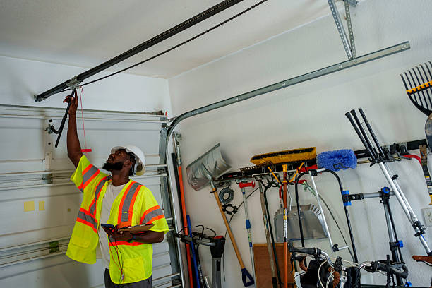 Professional Garage Door Panel Replacement technician working in Tipton, IA