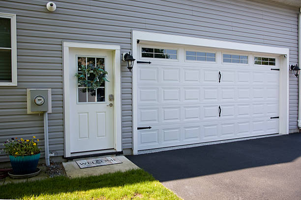 24/7 Emergency Garage Door Panel Replacement experts in Tipton, IA